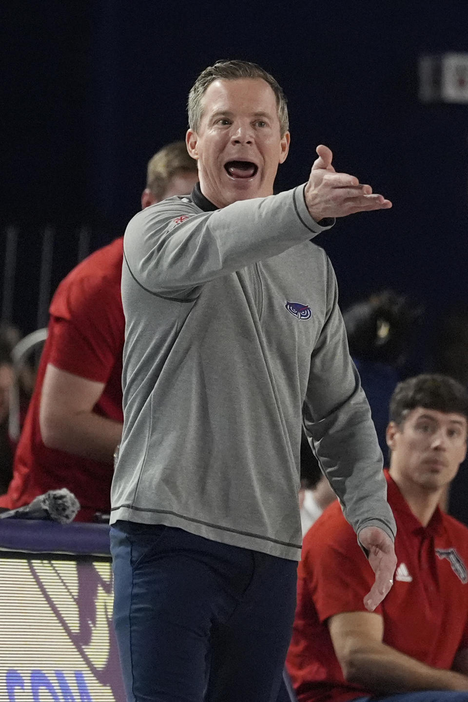 Florida Atlantic head coach Dusty May gestures during the first half of an NCAA college basketball game against UAB, Sunday, Jan. 14, 2024, in Boca Raton, Fla. (AP Photo/Marta Lavandier)