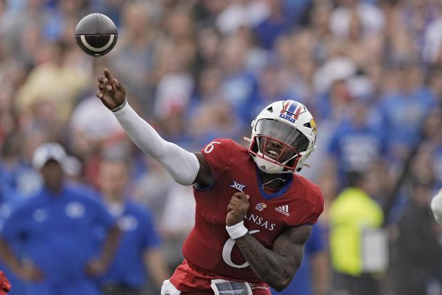 Daniels throws 3 TD passes, KU gets 2 defensive scores to beat BYU