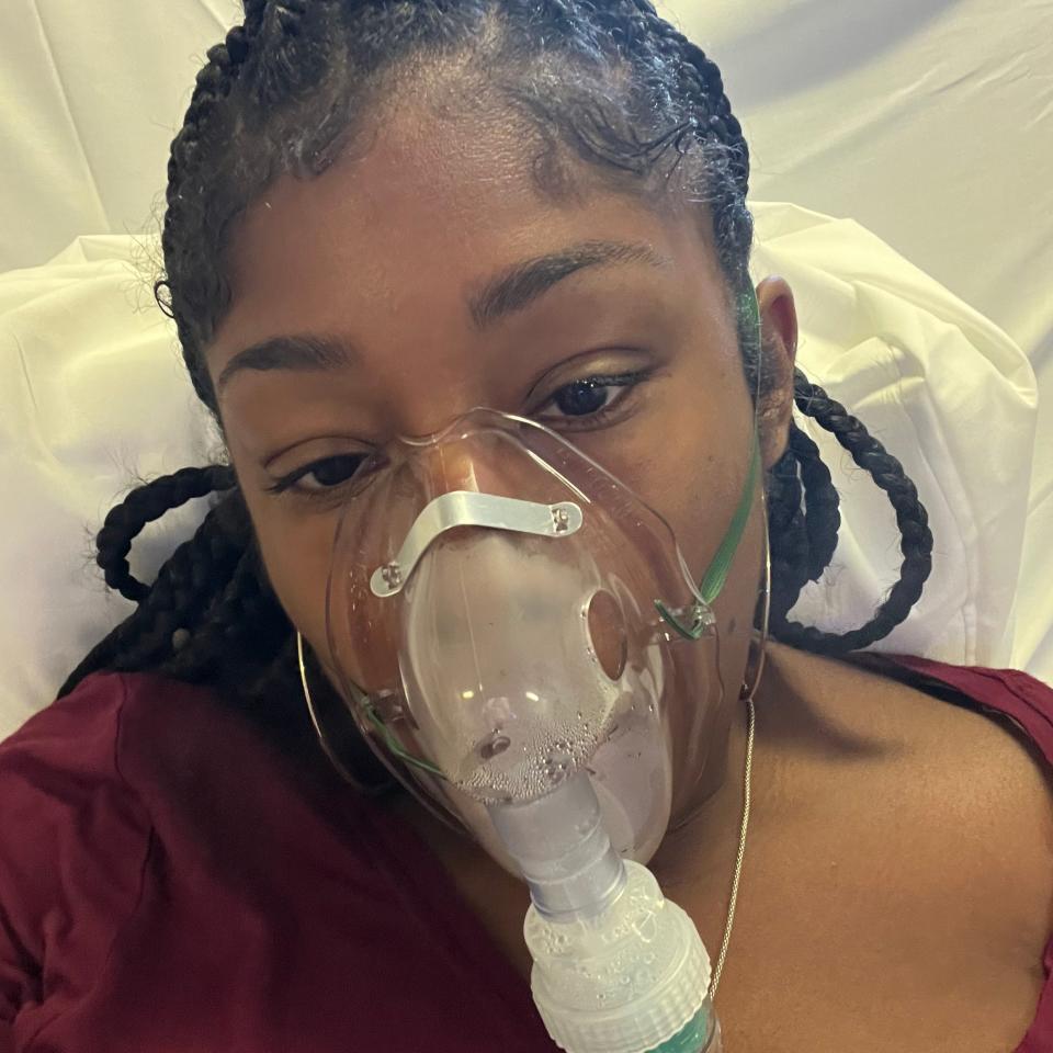 Sade King on oxygen aboard the Carnival Sunrise, where she suffered an asthma attack.