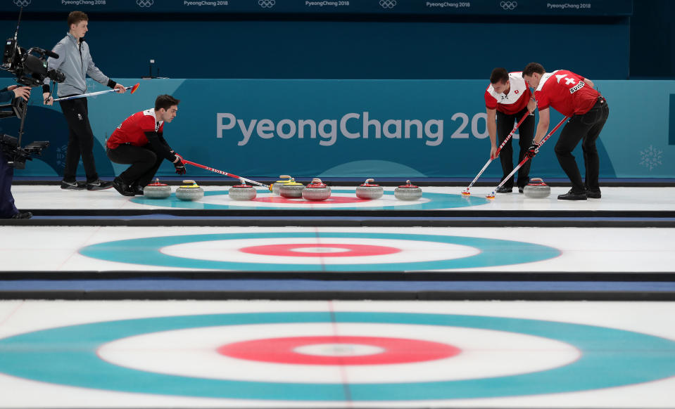 <p>Switzerland populate the head in end 9 at the Gangneung Curling Centre during day thirteen of the PyeongChang 2018 Winter Olympic Games in South Korea. PRESS ASSOCIATION Photo. Picture date: Thursday February 22, 2018. See PA story OLYMPICS Curling. (Getty) </p>