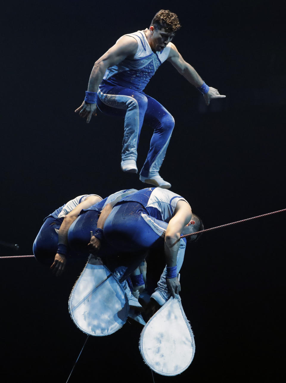 A Ringling Bros. and Barnum & Bailey acrobat jumps on a high wire during a performance Saturday, Jan. 14, 2017, in Orlando, Fla. The Ringling Bros. and Barnum & Bailey Circus will end the "The Greatest Show on Earth" in May, following a 146-year run of performances. Kenneth Feld, the chairman and CEO of Feld Entertainment, which owns the circus, told The Associated Press, declining attendance combined with high operating costs are among the reasons for closing. (AP Photo/Chris O'Meara)