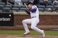 New York Mets' Pete Alonso reacts after being hit by a ball during the eighth inning of a baseball game against the San Diego Padres at Citi Field, Sunday, June 13, 2021, in New York. (AP Photo/Seth Wenig)