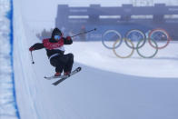 Britain's Gus Kenworthy falls during the men's halfpipe finals at the 2022 Winter Olympics, Saturday, Feb. 19, 2022, in Zhangjiakou, China. (AP Photo/Gregory Bull)