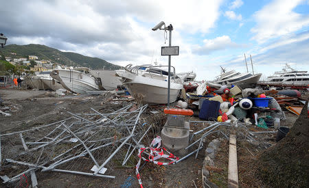 Destroyed yachts lie on the shore after windstorm and the strong sea storm in Rapallo, Italy, October 30, 2018. REUTERS/Massimo Pinca