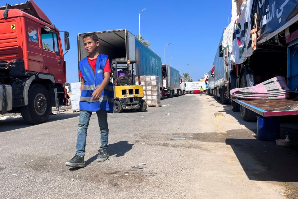 Humanitarian aid convoy for the Gaza Strip is parked in Arish, Egypt (Copyright 2023 The Associated Press. All rights reserved.)