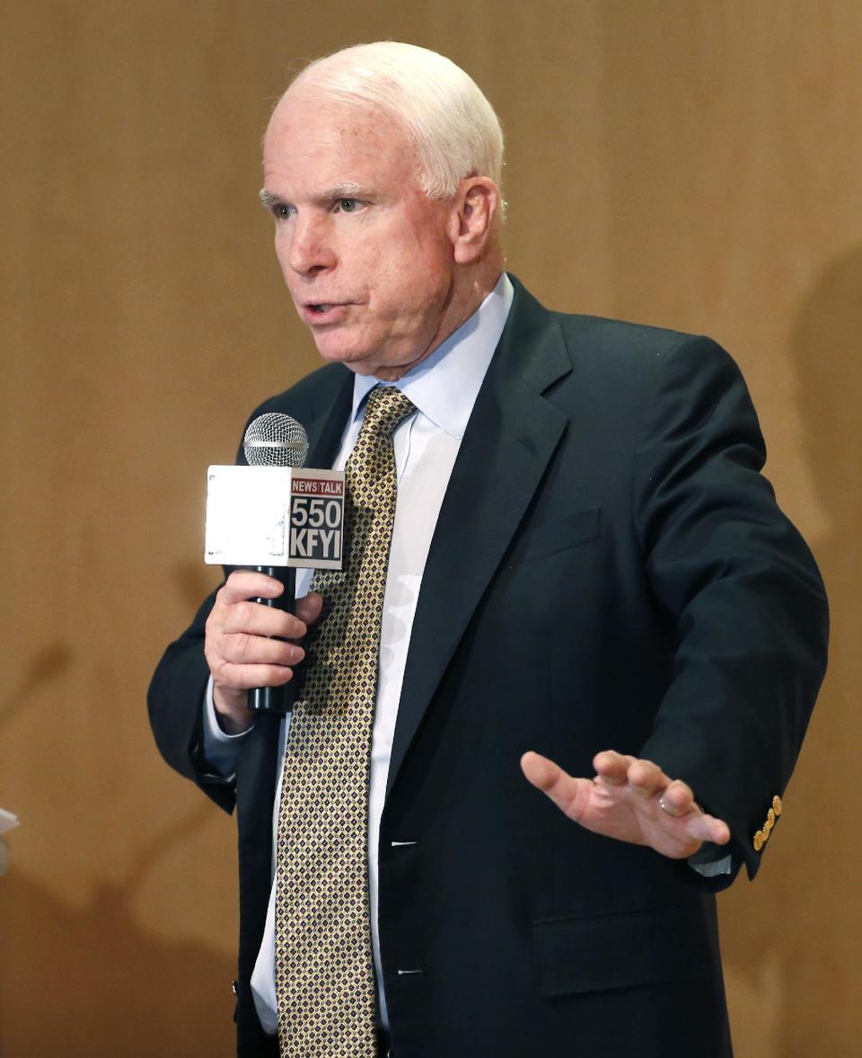 Sen. John McCain speaks during a forum with veterans on Friday, May 9, 2014, in Phoenix. McCain was discussing lapses in care at the Phoenix Veterans Affairs hospital that prompted a national review of operations around the country. (AP Photo/Matt York)