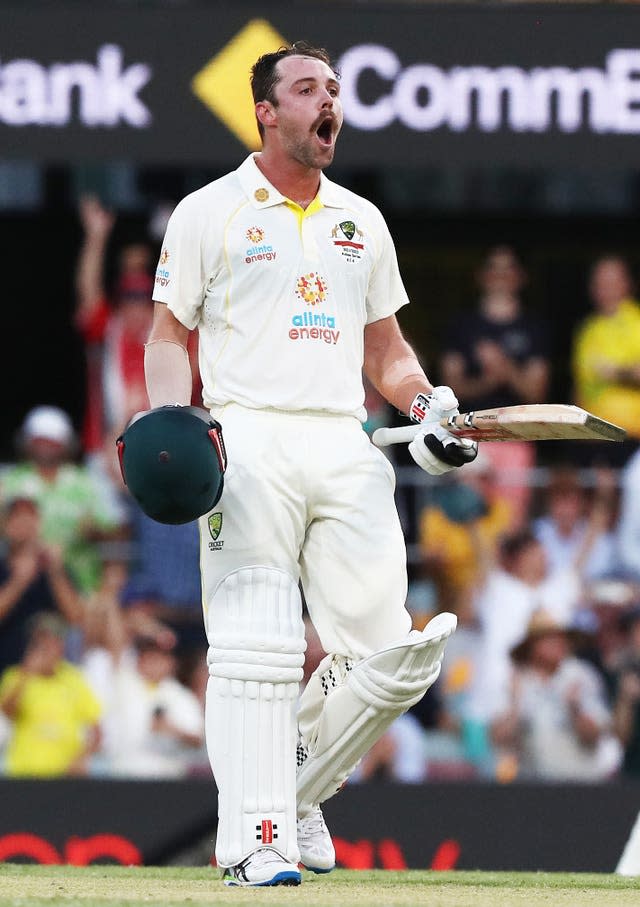Australia&#x002019;s Travis Head celebrates his century during day two of the first Ashes test at The Gabba, Brisbane.