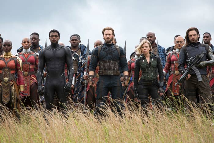 Marvel's Avengers characters standing together in a battle stance in Wakanda