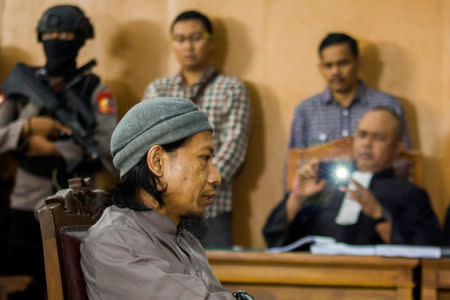 Islamic cleric Aman Abdurrahman is seen inside a courtroom in Jakarta, Indonesia May 18, 2018 in this photo taken by Antara Foto. Antara Foto/Galih Pradipta/via REUTERS