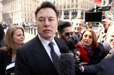 FILE PHOTO: Tesla CEO Elon Musk arrives at Manhattan federal court for a hearing on his fraud settlement with the Securities and Exchange Commission (SEC) in New York City, U.S. April 4, 2019. REUTERS/Brendan McDermid/File Photo