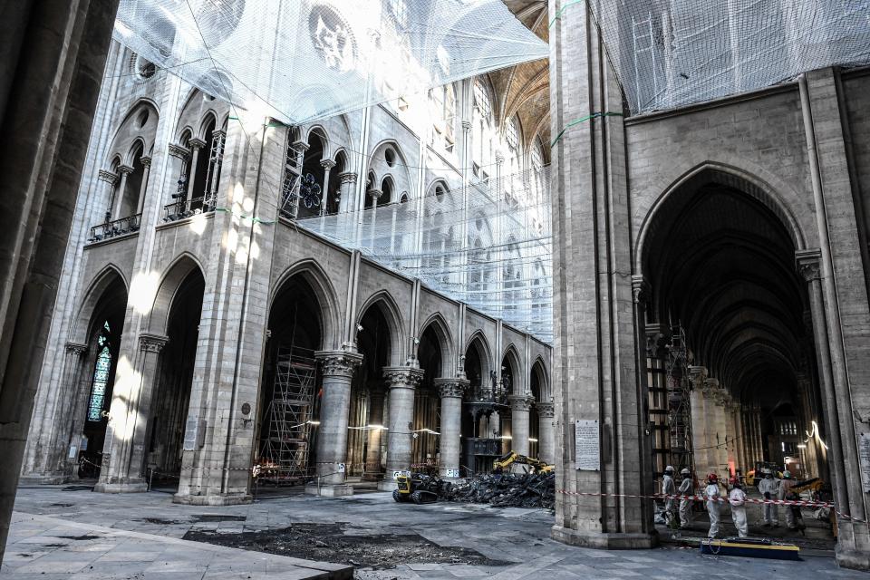 Damage on the nave and rubble are seen during preliminary work in the Notre Dame Cathedral three months after a major fire July 17, 2019 in Paris. (Photo: Stephane de Sakutin/Pool via AP)           