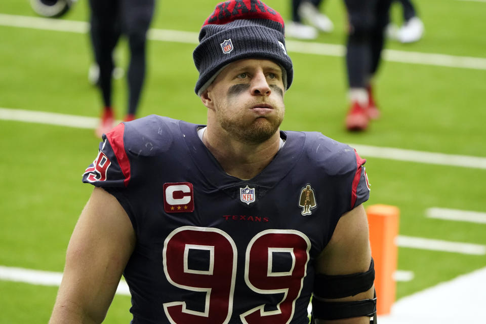 Houston Texans defensive end J.J. Watt leaves the field after his team lost to the Bengals. (AP Photo/Eric Christian Smith)