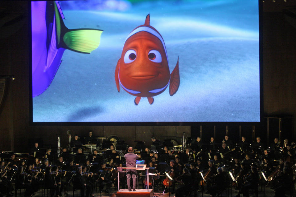 David Newman leads the New York Philharmonic in "Pixar in Concert" at Avery Fisher Hall on Thursday night, May 1, 2014.This image:"Finding Nemo."(Photo by Hiroyuki Ito/Getty Images)