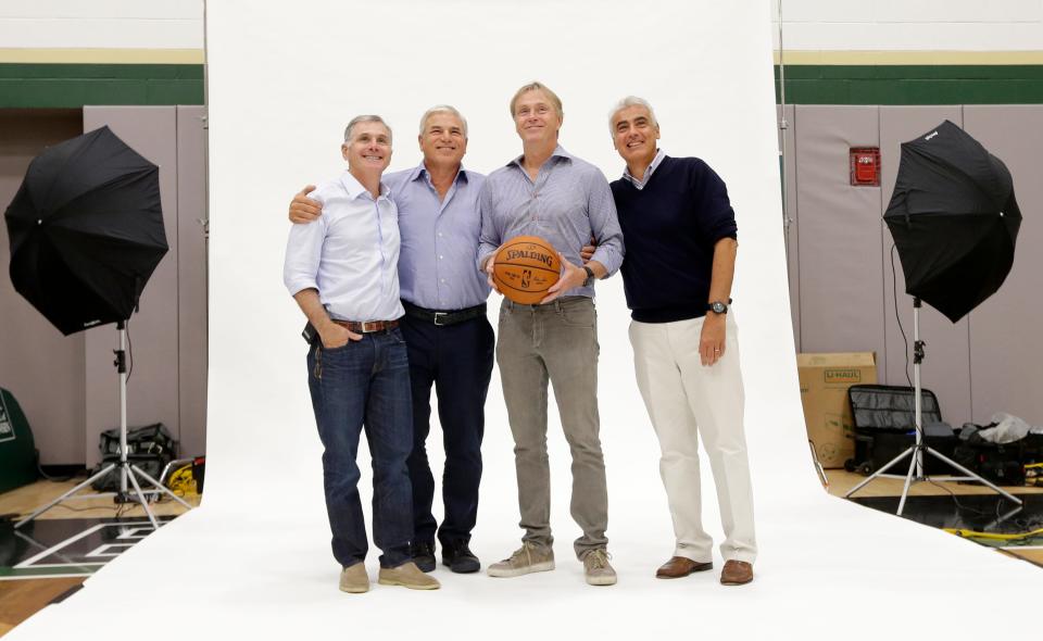 The Bucks ownership group led by Wes Edens (second from right) and Marc Lasry (far right) invested resources to help build a championship team.