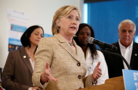 U.S. Democratic presidential nominee Hillary Clinton speaks about the Zika virus during a visit to Borinquen Health Care Center in Miami, Florida August 9, 2016. REUTERS/Chris Keane