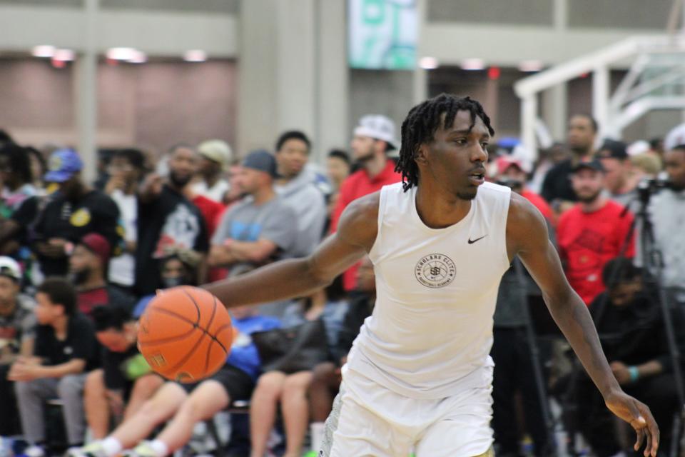 Aaron Bradshaw of the NJ Scholars warms up before an AAU basketball game Saturday, May 28, 2022, at the Kentucky Exposition Center in Louisville, Ky. Bradshaw is one of the top recruits in the 2023 class and has scholarship offers form both Louisville and Kentucky.