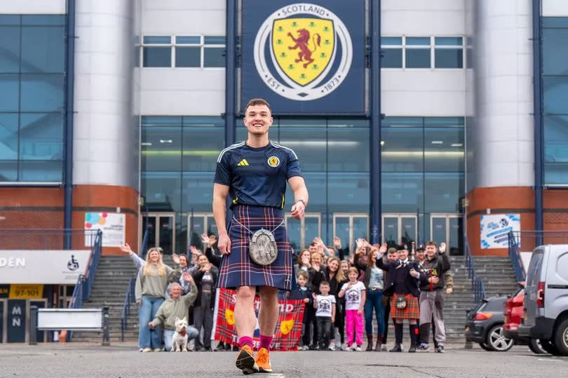 Craig Ferguson, 20, begins his 1,000 mile walk from Scotland's national football stadium Hampden Park, in Glasgow, to Munich