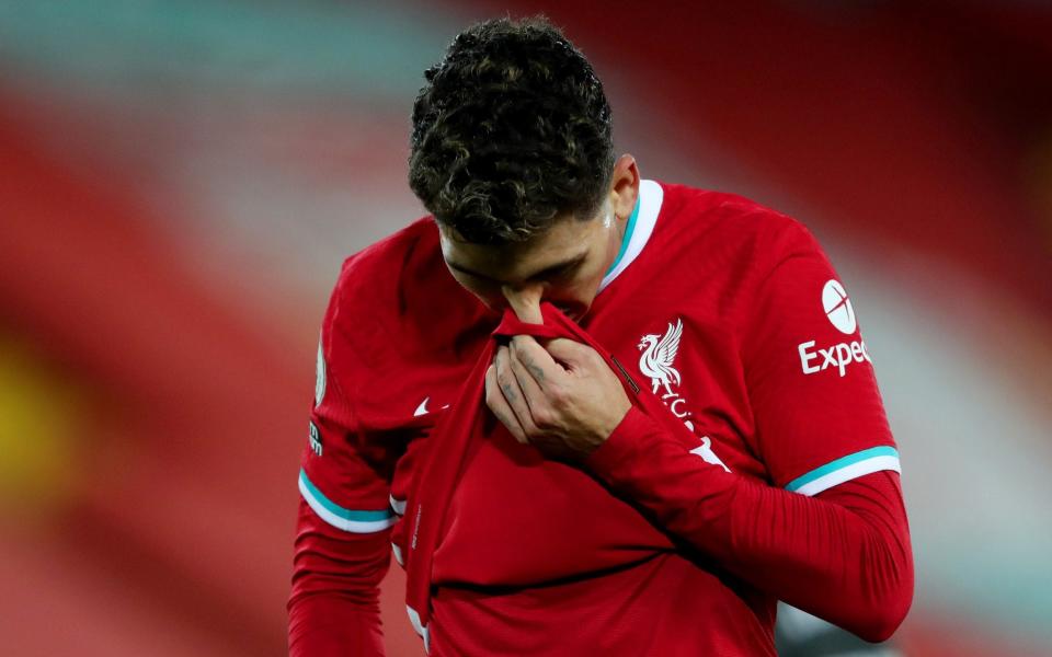 Reaction from Liverpool's Roberto Firmino during the Premier League match between Liverpool and Manchester United at Anfield on January 17, 2021 in Liverpool, United Kingdom. - GETTY IMAGES