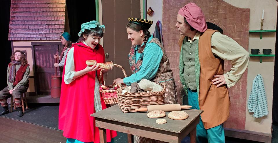 Brooke Tucker as "Little Red Riding Hood,' Jeana Lutz Bowman as "The Baker's Wife" and Anthony DeTrano as "The Baker" in the HNJ Players' production of "Into the Woods," on stage at Holy Name of Jesus Life Center Hall in Indialantic from Feb. 2 through 11, 2024. Visit hnj.org.