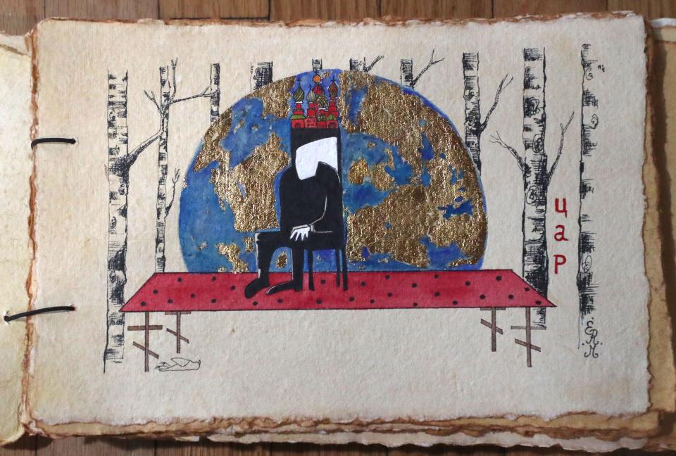 The artbook's second drawing, called "The Dictator," illustrates a faceless Russian President Vladimir Putin, apparently wearing the Kremlin as a crown with Earth in the background. “He is very alone, sitting on a throne on the table,” Richard explained. “The feet of the table are made of crosses of people who died because of him.”