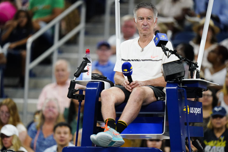 John McEnroe takes over the roll of chair umpire during a "The Tennis Plays for Peace" exhibition match to raise awareness and humanitarian aid for Ukraine Wednesday, Aug. 24, 2022, in New York. The 2022 U.S. Open Main Draw will begin on Monday, Aug. 29, 2022. (AP Photo/Frank Franklin II)