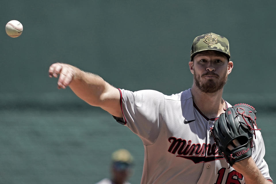 Minnesota Twins starting pitcher Bailey Ober throws during the first inning of a baseball game against the Minnesota Twins Sunday, May 22, 2022, in Kansas City, Mo. (AP Photo/Charlie Riedel)