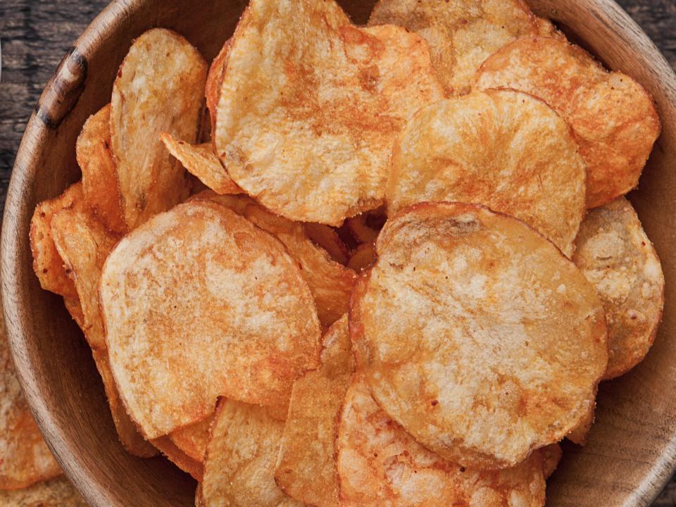 Bowl of red-orange ketchup chips