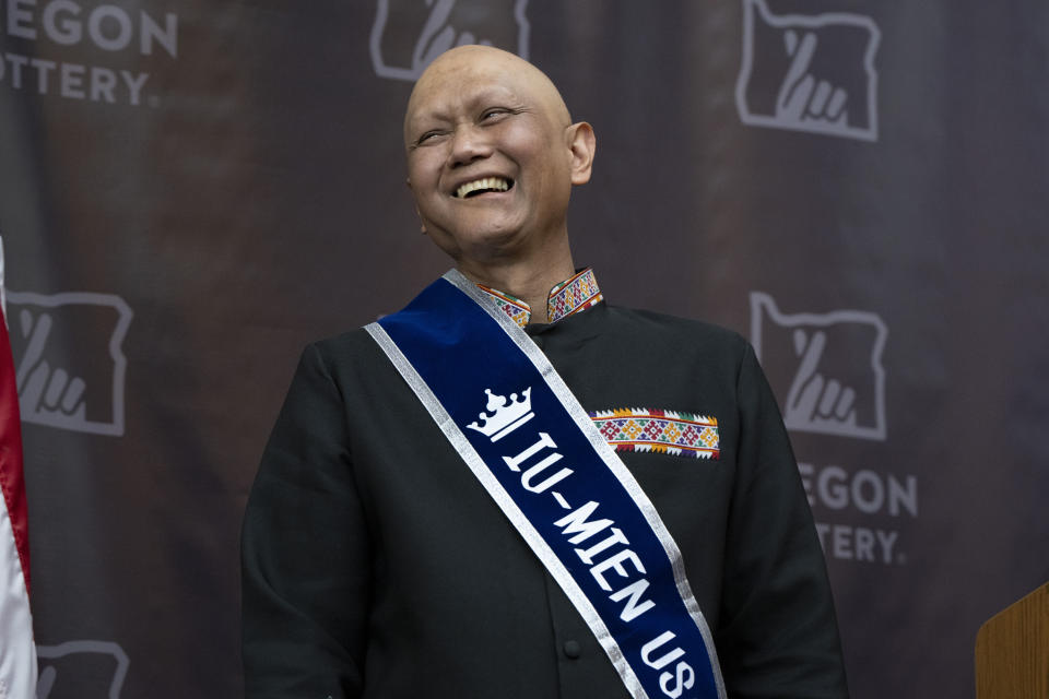 Cheng "Charlie" Saephan laughs while speaking during a press conference after it was revealed that he was one of the winners of the $1.3 billion Powerball jackpot at the Oregon Lottery headquarters on Monday, April 29, 2024, in Salem, Ore. (AP Photo/Jenny Kane)