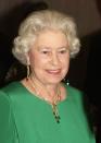 <p>Queen Elizabeth wore the gold Delhi Durbar set to a royal gala in Wales in 2004. The featured emeralds had once <a href="https://www.harpersbazaar.com/wedding/bridal-fashion/g23656976/best-royal-family-jewelry-of-all-time/?slide=24" rel="nofollow noopener" target="_blank" data-ylk="slk:belonged;elm:context_link;itc:0;sec:content-canvas" class="link ">belonged</a> to Queen Mary's grandmother. <br></p>