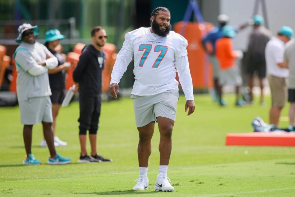 Miami Dolphins offensive tackle Isaiah Wynn (77) works out during training camp at Baptist Health Training Facility in Miami Gardens, Florida, Thursday, July 27, 2023.