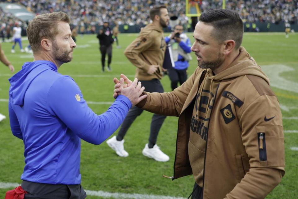 Rams coach Sean McVay, left, and Packers coach Matt LaFleur shake hands after Green Bay's 20-3 victory.