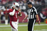 Arizona Cardinals quarterback Kyler Murray (1) takes off his helmet after throwing an interception against the Minnesota Vikings during the second half of an NFL football game, Sunday, Sept. 19, 2021, in Glendale, Ariz. (AP Photo/Ross D. Franklin)