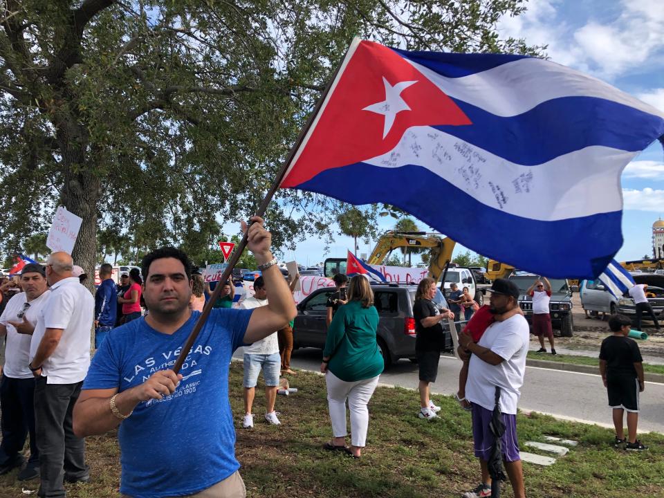 Sarasota resident George Ortega participated in a 2021 demonstration in solidarity with anti-government protesters in Cuba. Ortega was born in Cuba. President Joe Biden's administration announced changes to Cuba policy this week, including allowing more travel to the island nation.