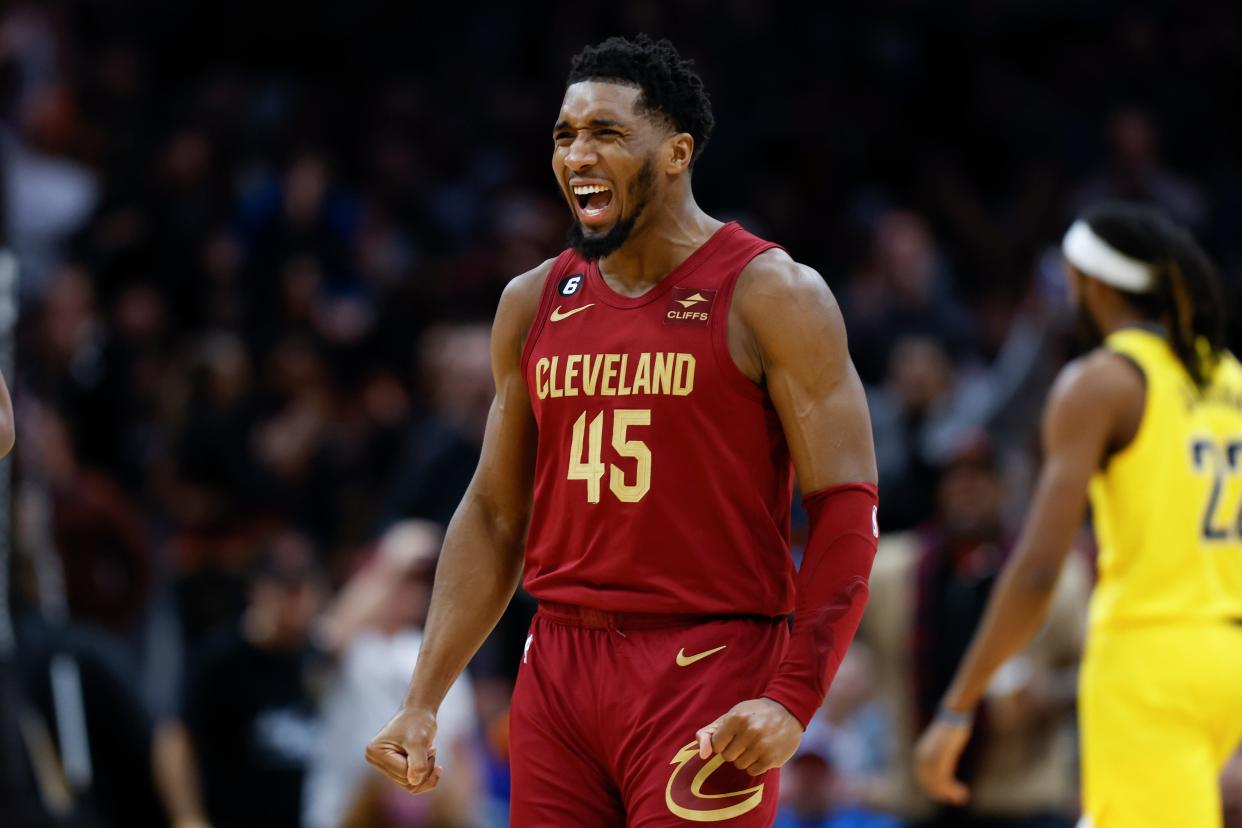 Cleveland Cavaliers guard Donovan Mitchell celebrates after making a 3-point basket against the Indiana Pacers during the second half of an NBA basketball game, Friday, Dec. 16, 2022, in Cleveland. (AP Photo/Ron Schwane)