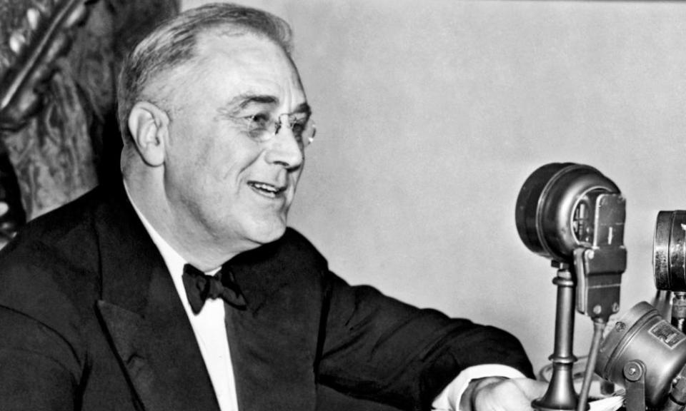 President Franklin D Roosevelt, seated behind microphone, Washington DC, 1937.