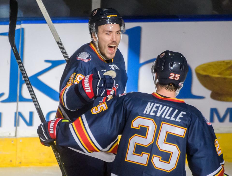 Peoria's Zach Wilkie celebrates his goal against Knoxville with teammate Nick Neville in the second period Friday, Jan. 13, 2023 at Carver Arena in Peoria. The Rivermen fell to the Ice Bears 6-4.