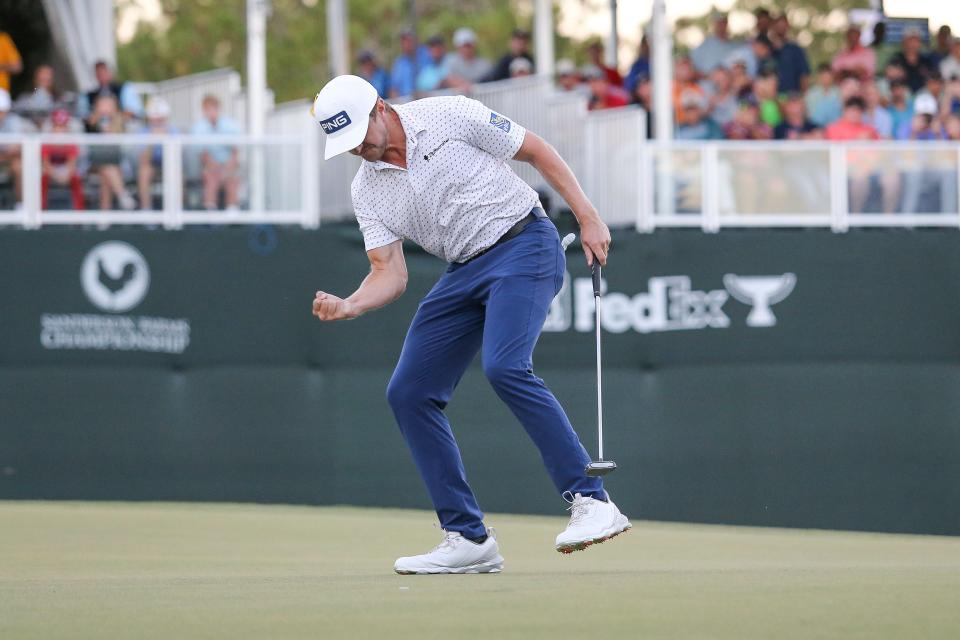 Mackenzie Hughes, a former Kent State star, reacts after winning the Sanderson Farms Championship golf tournament on Sunday in Jackson, Miss.