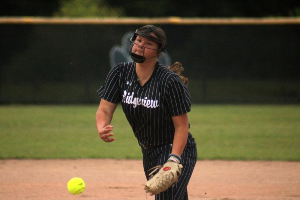 Ridgeview's Saige Bialek delivers a pitch during the Class 5A softball playoffs.