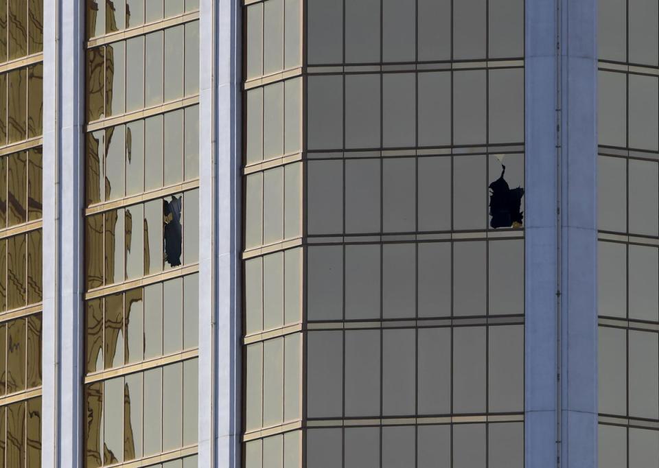 Damaged windows on the 32nd floor of the Mandalay Hotel in Las Vegas through which Paddock fired (AFP via Getty Images)