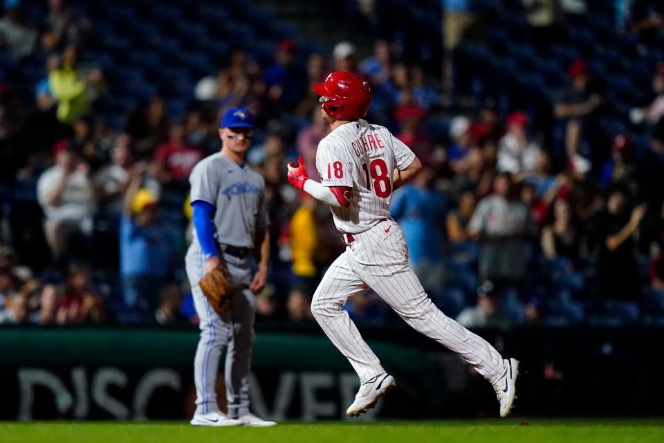 Philadelphia Phillies' Dalton Guthrie rounds the bases after hitting a home run against Toronto Blue Jays pitcher Ross Stripling during the fifth inning of a baseball game, Tuesday, Sept. 20, 2022, in Philadelphia. (AP Photo/Matt Slocum)
