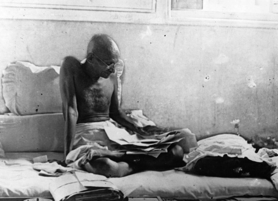 Indian statesman Mahatma Gandhi (Mohandas Karamchand Gandhi, 1969 - 1948) fasts in protest against British rule after his release from prison in Poona, India.    (Photo by Keystone/Getty Images)