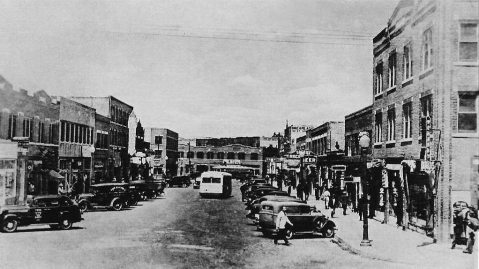 Before the 1921 race massacre, Greenwood Avenue in Tulsa was a bustling commercial center. (Greenwood Cultural Center/Getty Images)