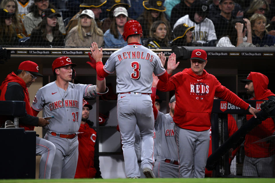 May 2, 2023; San Diego, California, USA; Cincinnati Reds second baseman Matt Reynolds (3) is congratulated at the dugout after scoring a run against the <a class="link " href="https://sports.yahoo.com/mlb/teams/san-diego/" data-i13n="sec:content-canvas;subsec:anchor_text;elm:context_link" data-ylk="slk:San Diego Padres;sec:content-canvas;subsec:anchor_text;elm:context_link;itc:0">San Diego Padres</a> during the tenth inning at Petco Park. Mandatory Credit: Orlando Ramirez-USA TODAY Sports