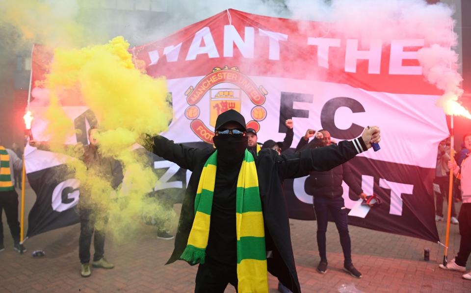 There were huge protests outside Old Trafford after the European Super League plans were announced - GETTY IMAGES