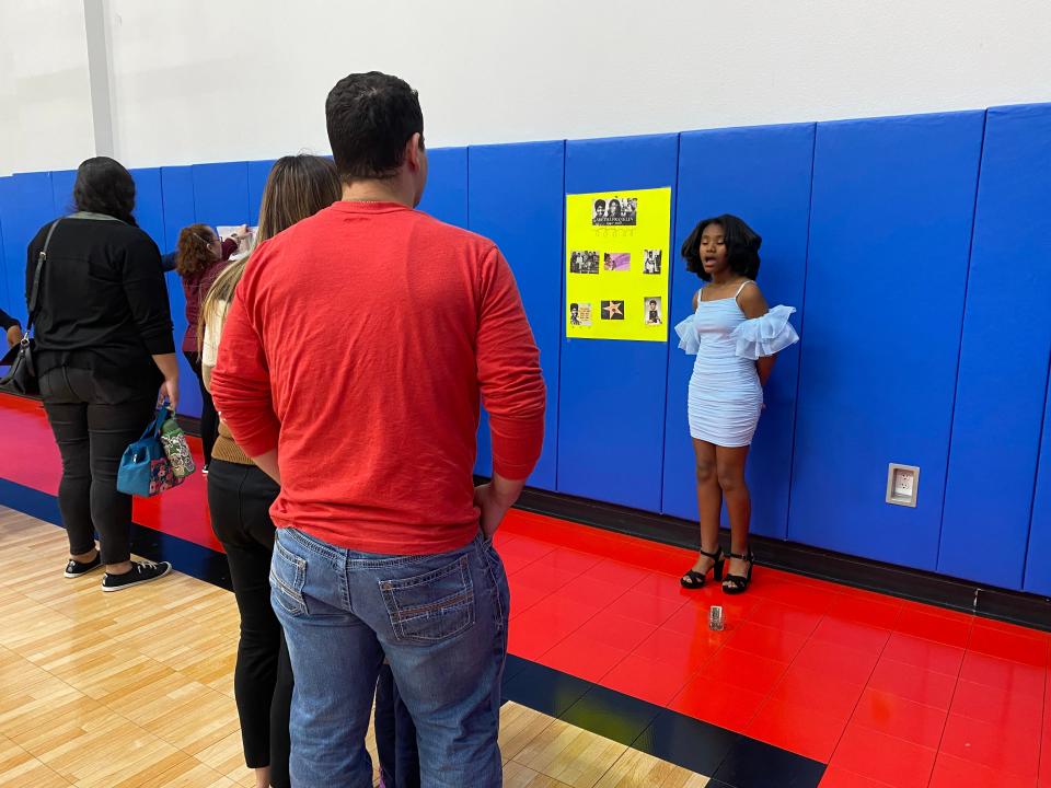 Fifth grader Avery Nuells shares her knowledge of Aretha Franklin at the School of Science and Technology Corpus Christi's Black History Month event Thursday.