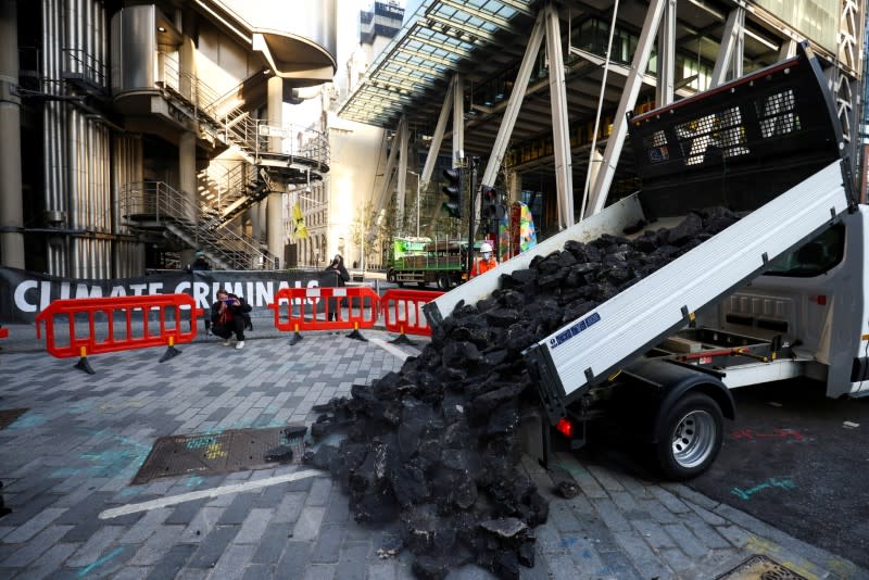 FILE PHOTO: Extinction Rebellion activists protest outside the Lloyd's building in London