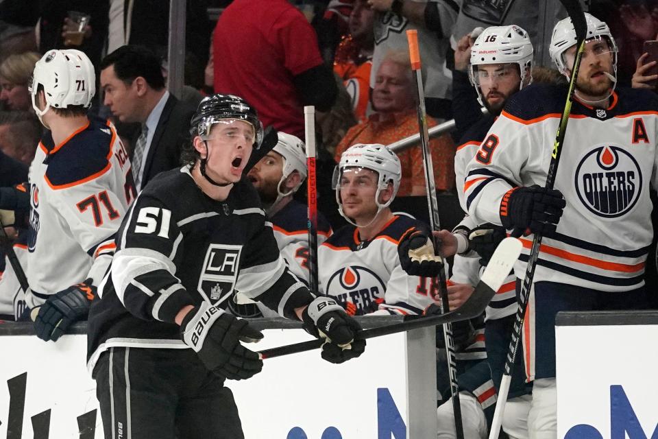 Los Angeles Kings defenseman Troy Stecher celebrates in front of the Edmonton Oilers' bench after scoring during the first period in Game 4 of an NHL hockey Stanley Cup first-round playoff series Sunday, May 8, 2022, in Los Angeles.