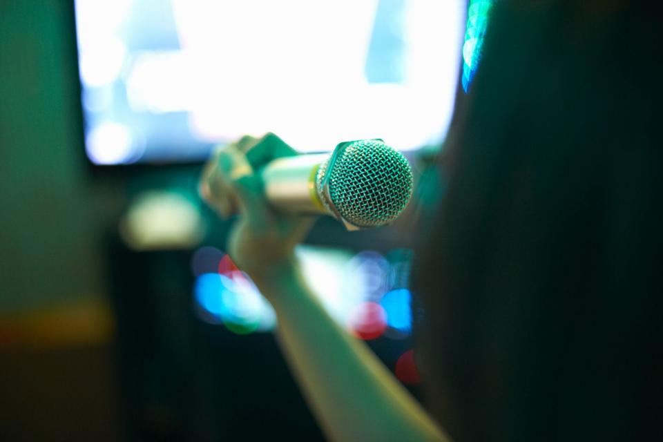 <p>Getty</p> A karaoke machine and microphone