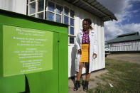 Catherine Masolia, Chief operation officer at WEEE center recycling plant, a collection point where people can deposit old electric equipment in Nairobi, Kenya Wednesday, March. 20, 2024. U.N. agencies have warned that electrical and electronic waste is piling up worldwide while recycling rates continue to remain low and are likely to fall even further. (AP Photo/Brian Inganga)