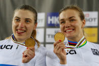 Cycling - UCI Track World Championships - Women's Team Sprint, Final - Hong Kong, China - 12/4/17 - Russia's Daria Shmeleva and Anastasiia Voinova pose with their medals. REUTERS/Bobby Yip